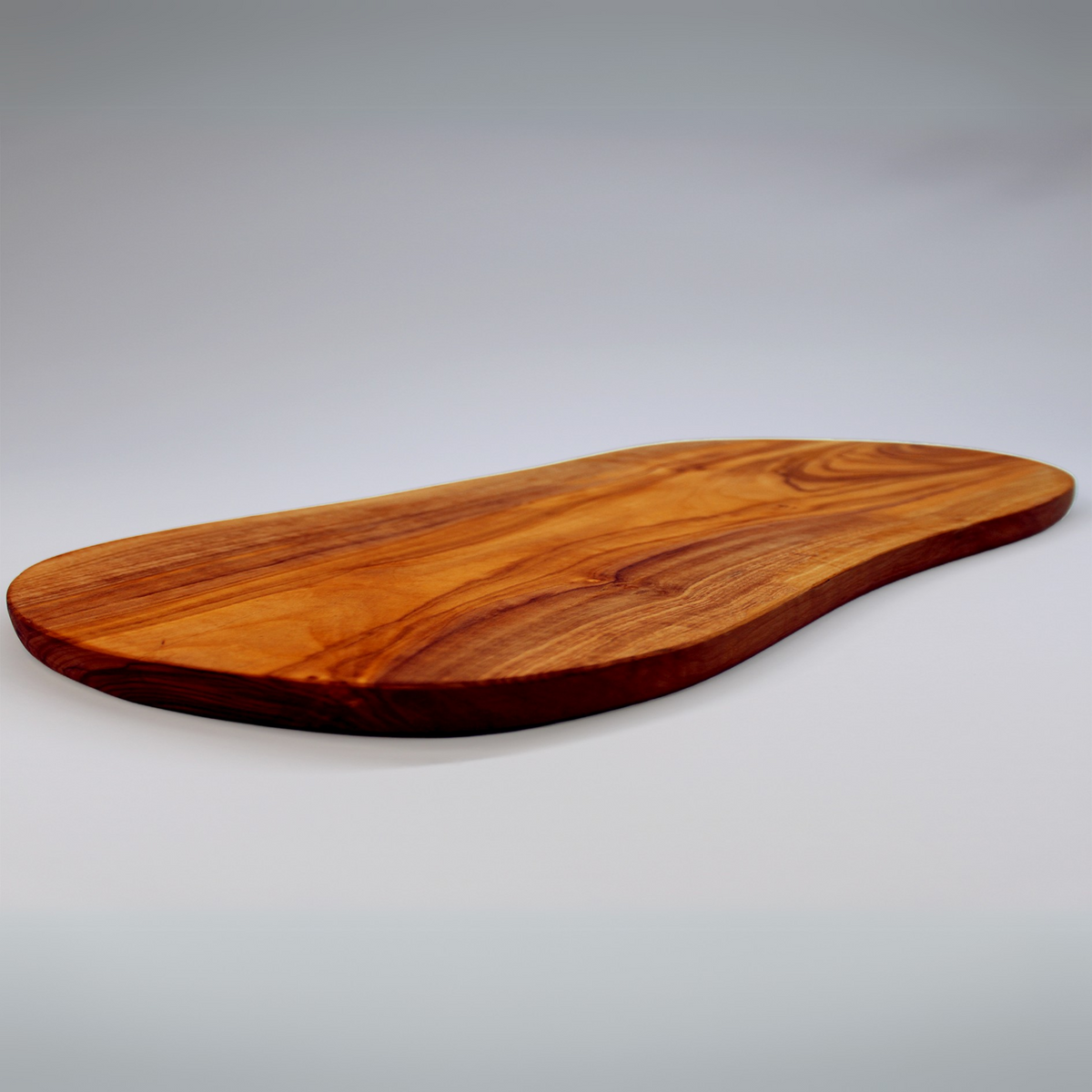 Handcrafted olive wood cutting and serving board by Art Olive, view 1